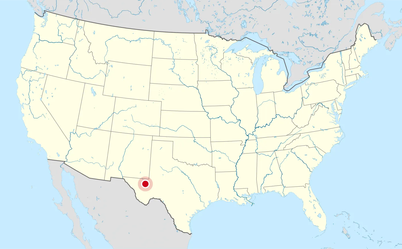 Map of the United States with a red marker on Pecos, in West Texas